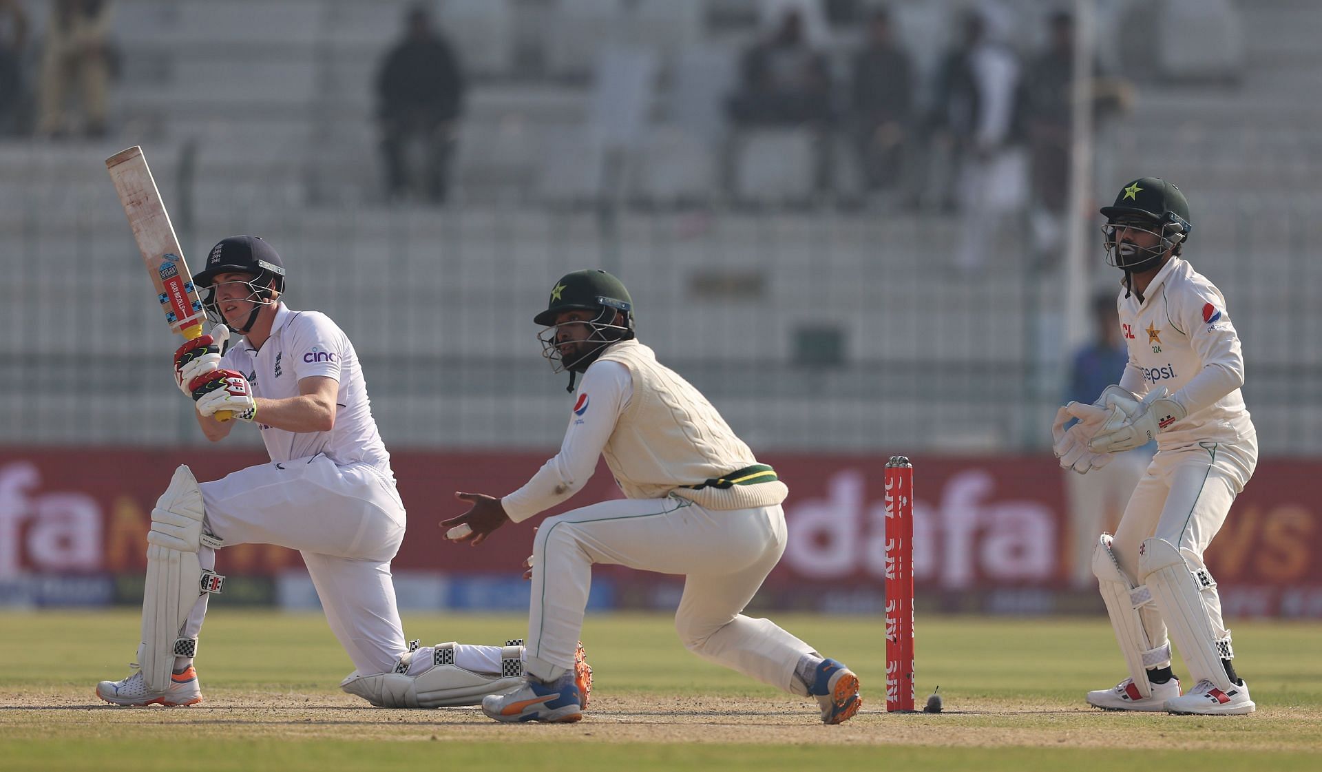 Pakistan v England - Second Test Match: Day Three MULTAN, PAKISTAN - DECEMBER 11: Harry Brook of England hits the &#039;Bazball&#039; towards the boundary during day three of the Second Test Match between Pakistan and England at Multan Cricket Stadium on December 11, 2022 in Multan, Pakistan. (Photo by Matthew Lewis/Getty Images)