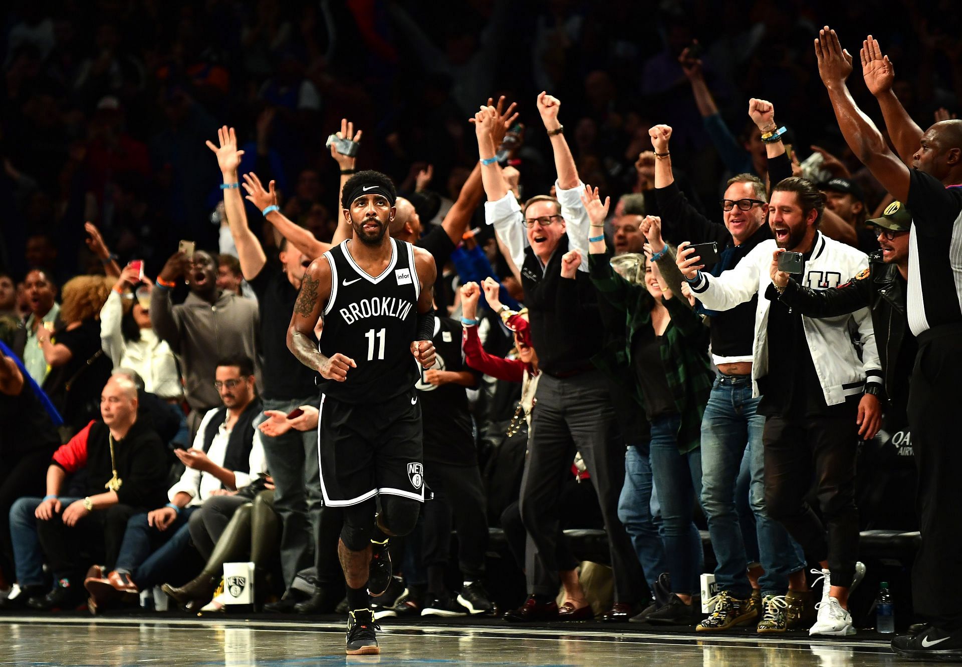 Brooklyn Nets fans celebrate their win over the New York Knicks.