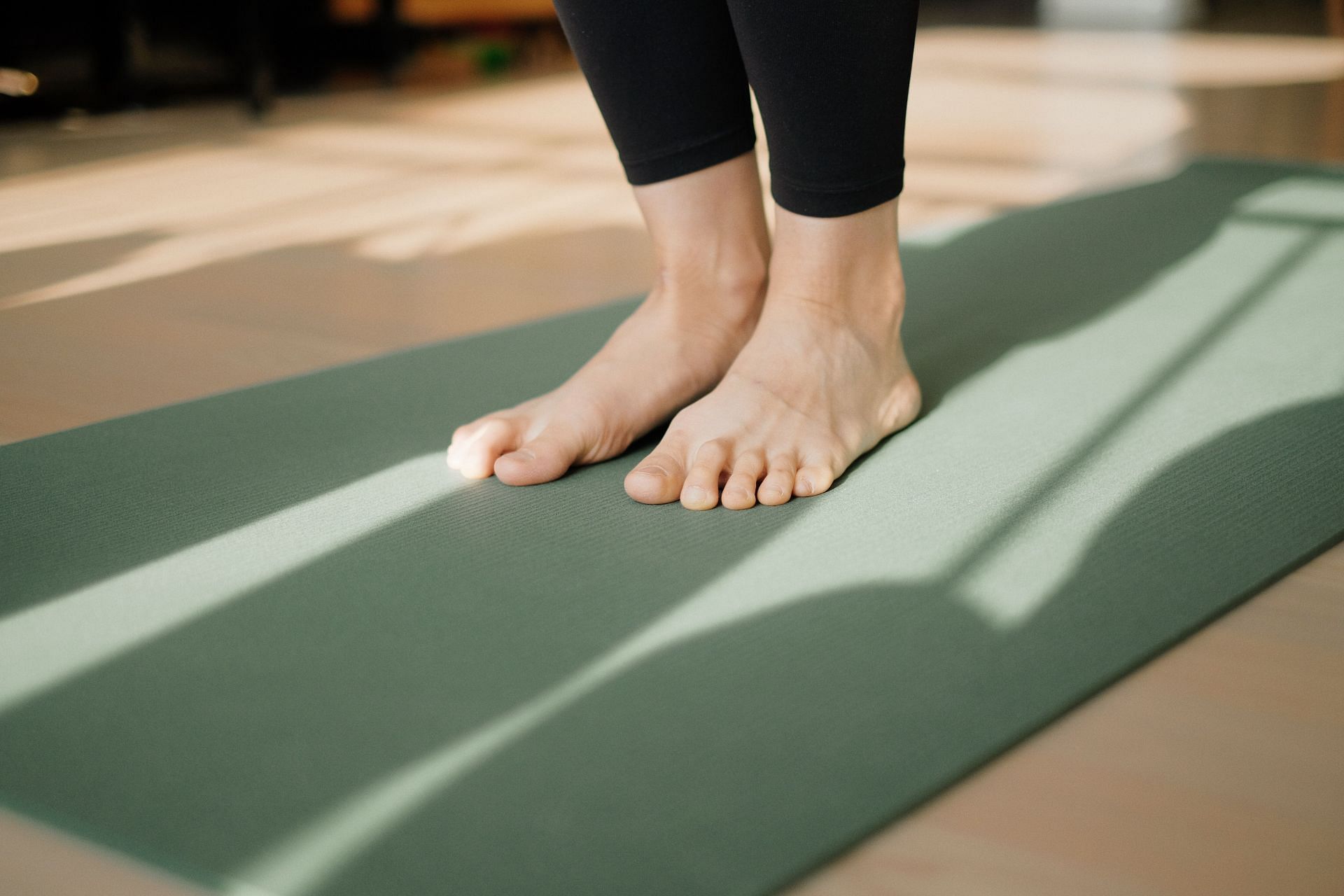 Yoga mats make performing asanas and other forms of exercise comfortable and secure. (Image via Unsplash/ Junseong Lee)