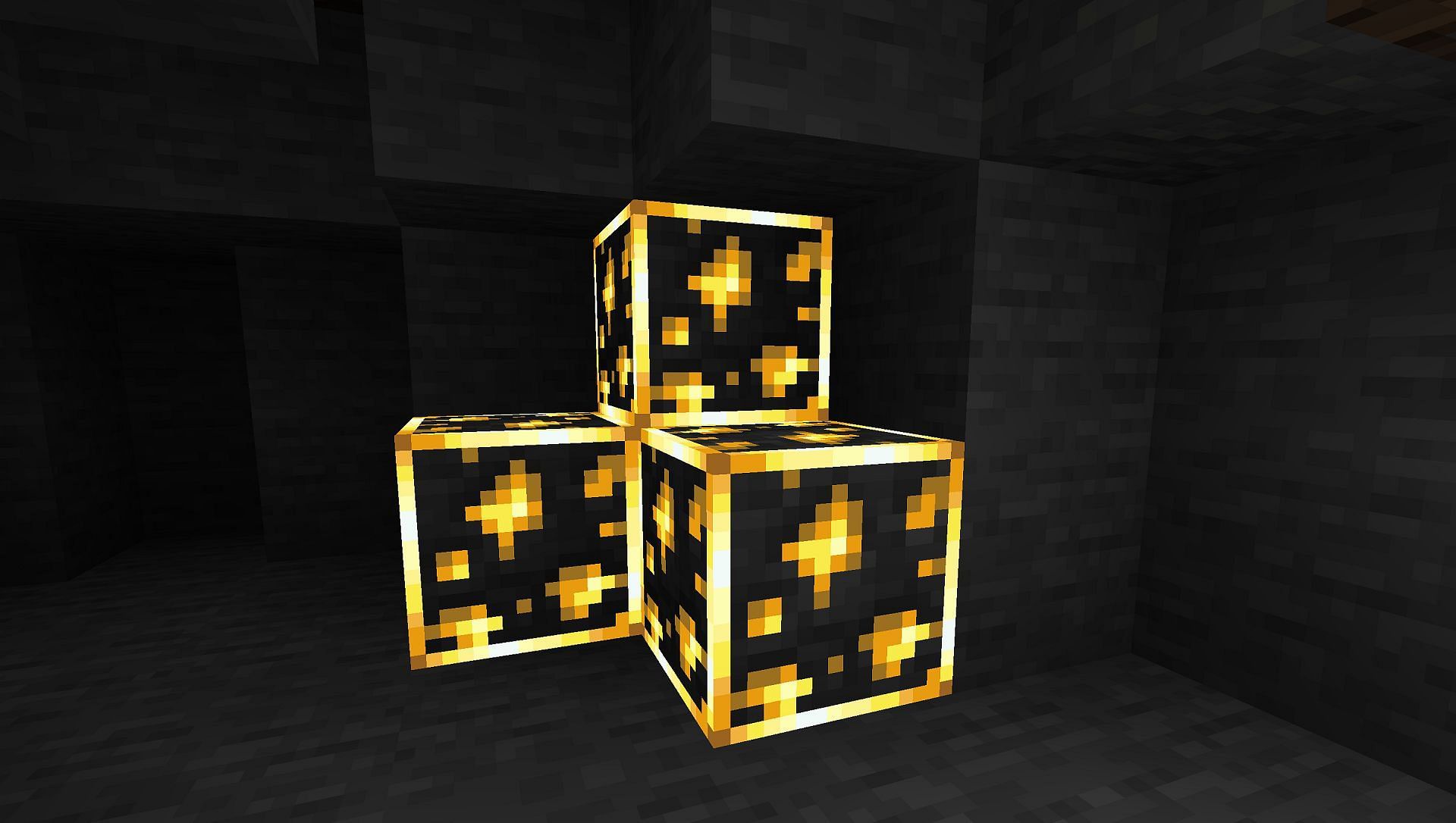 Illuminated gold ore thanks to New Glowing Ores in Minecraft (Image via GridExpert/CurseForge)