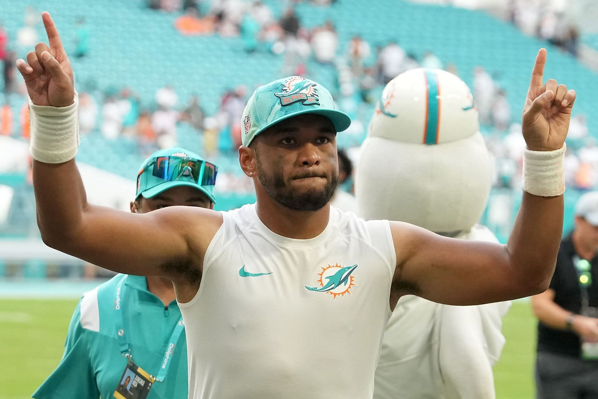 Tua Tagovailoa of the Miami Dolphins celebrates after a win over the Houston Texans