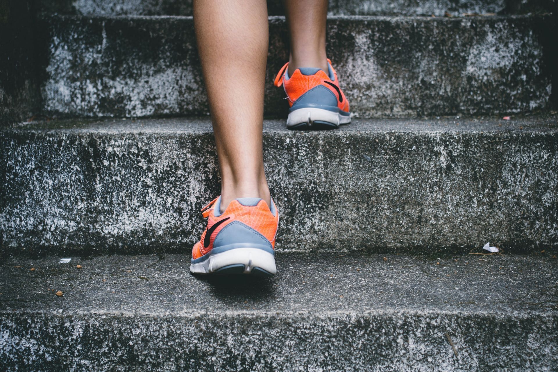 Instead of using the escalator or elevator, use the stairs. (Image via Unsplash/ Bruno Nascimento)