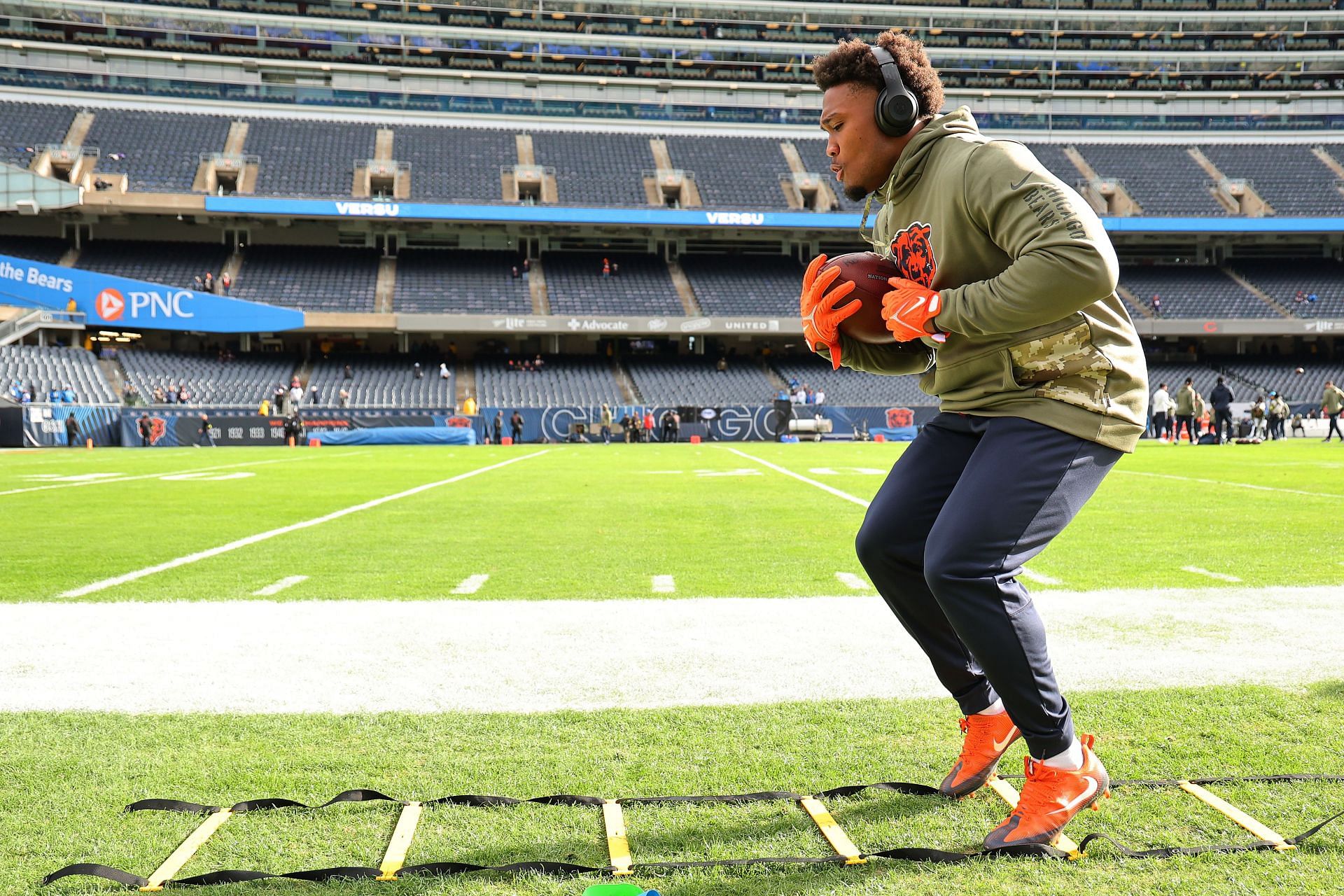 Khalil Herbert of the Chicago Bears warms up prior to the game against the Detroit Lions