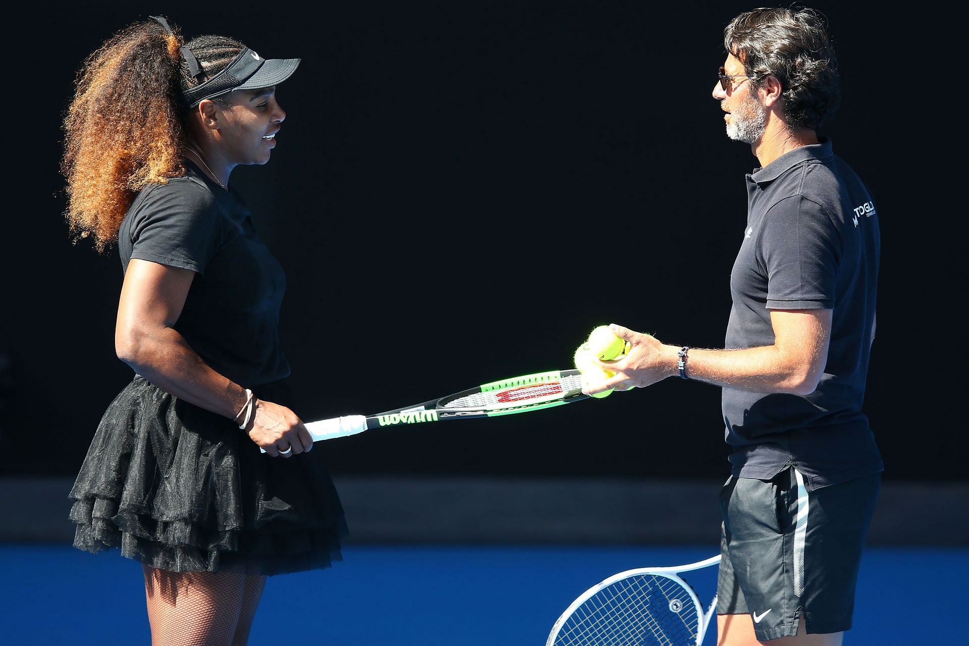 Serena Williams (L) and Patrick Mouratoglou