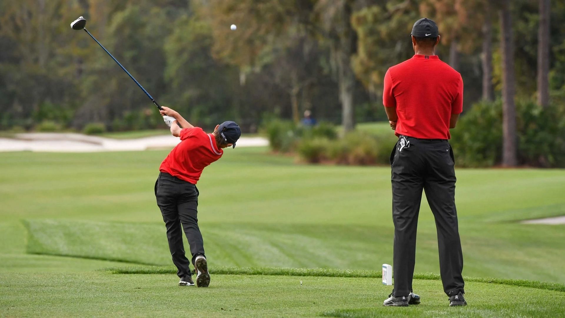 Tiger's advises his son to not copy his swing 