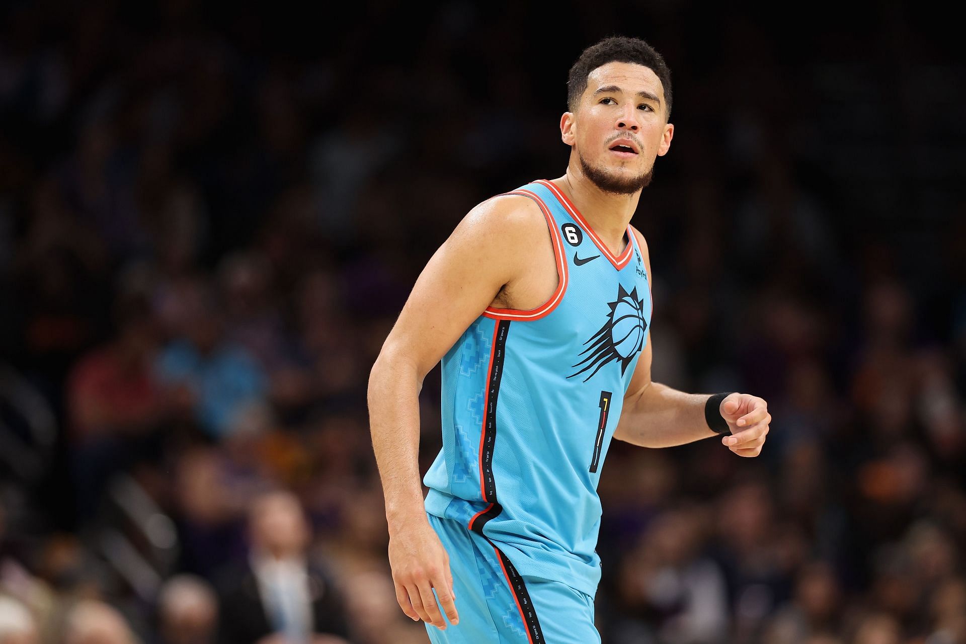 Suns Uniform Tracker on X: Devin Booker giving us a sneak peek at the new  Suns uniforms. Notice that the trim patterns match my latest predictions.  You can also see a little