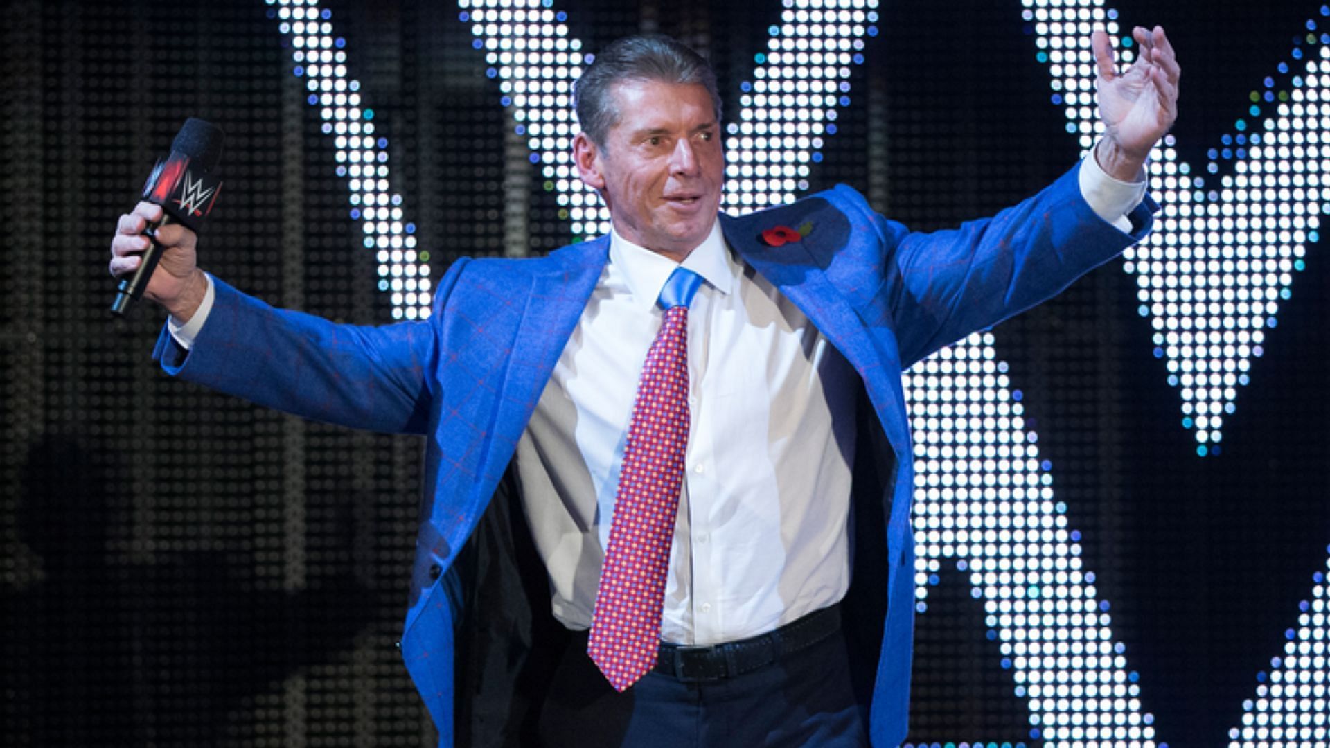 Former WWE CEO Vince McMahon posing on the entrance ramp