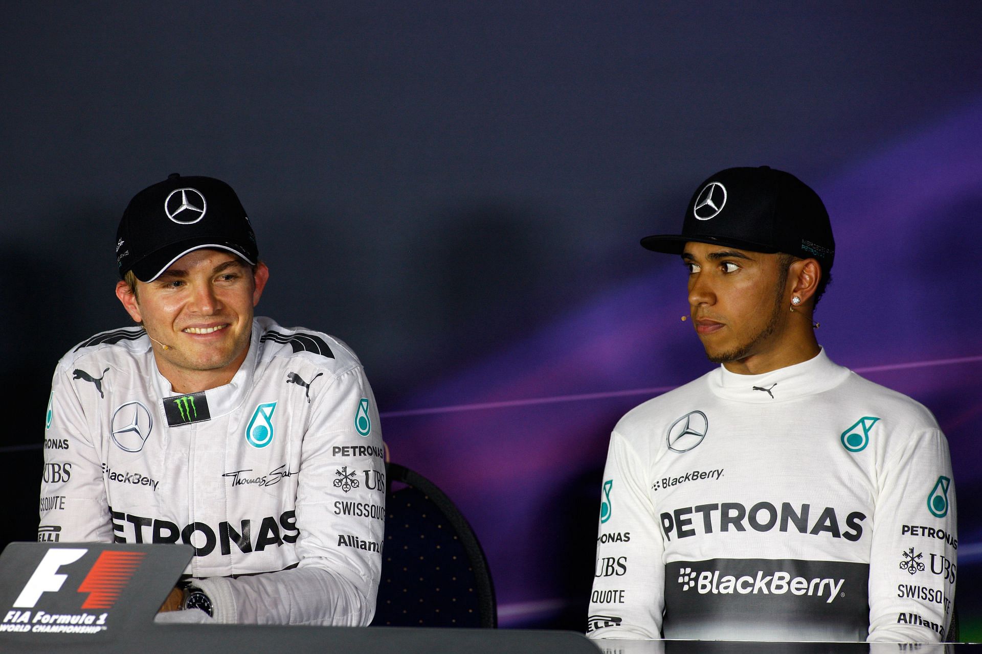 Nico Rosberg of Germany and Mercedes GP and Lewis Hamilton of Great Britain and Mercedes GP (Photo by Drew Gibson/Getty Images)