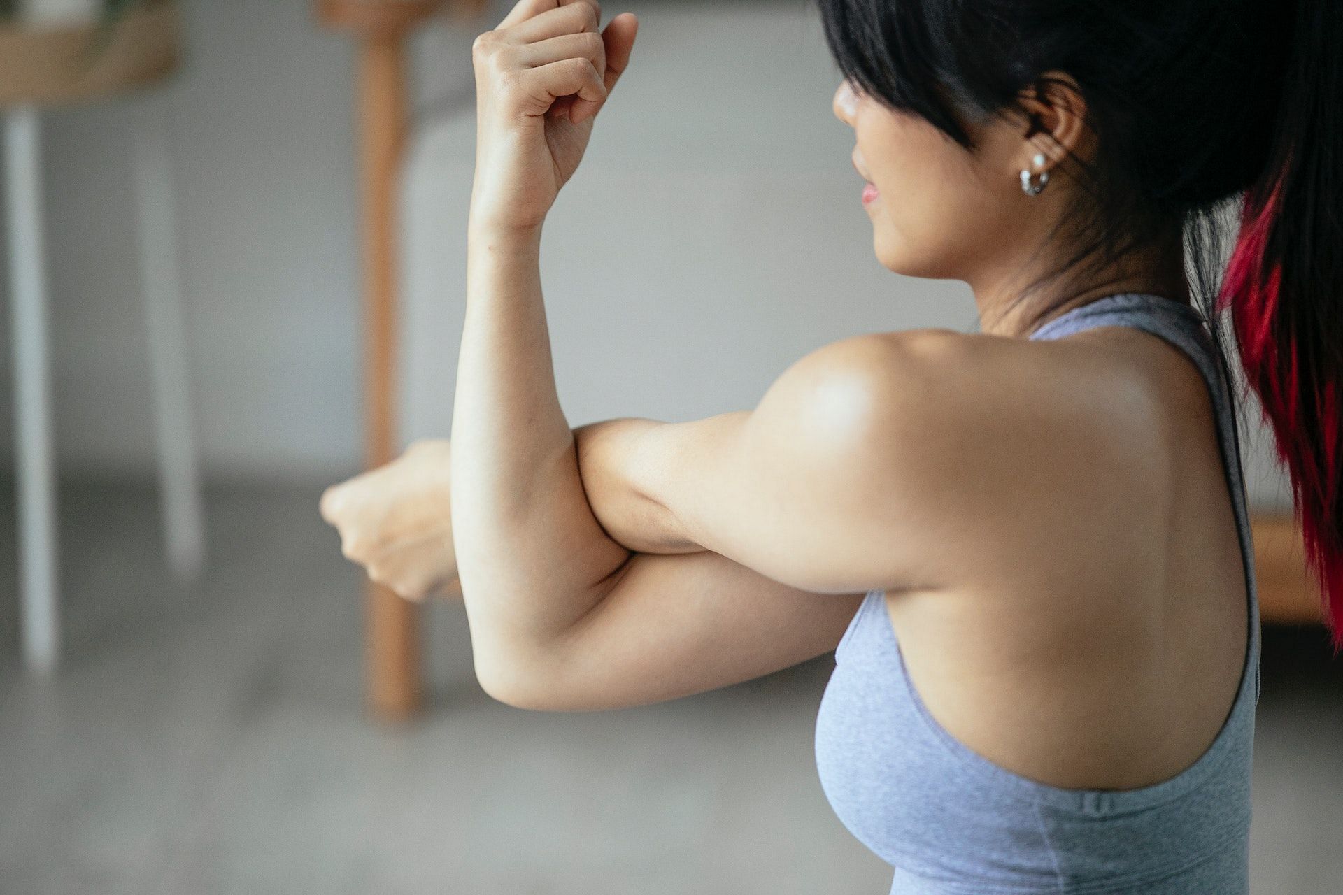 Exercises for rotator cuff injury gently stretch the muscles and promote flexibility. (Photo via Pexels/Miriam Alonso)