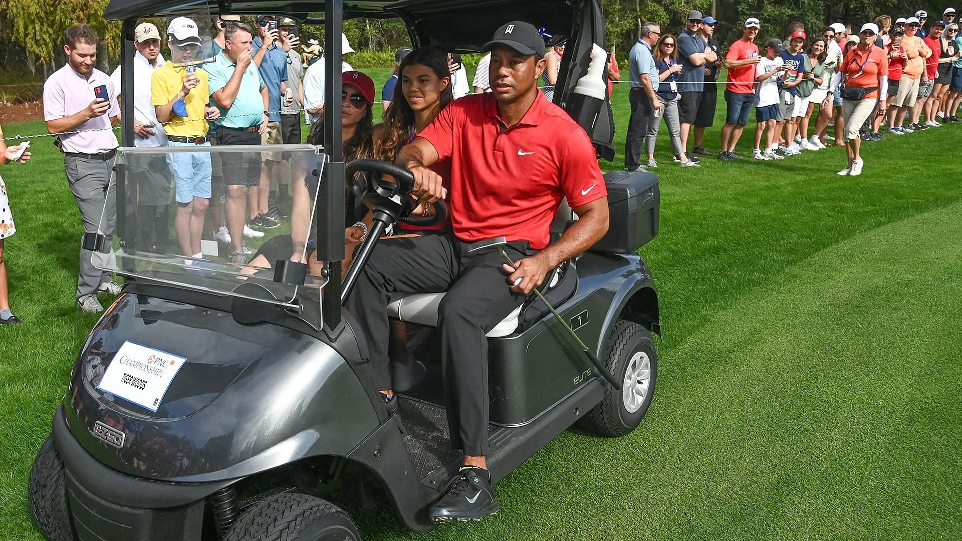 Tiger Woods driving cart in last year