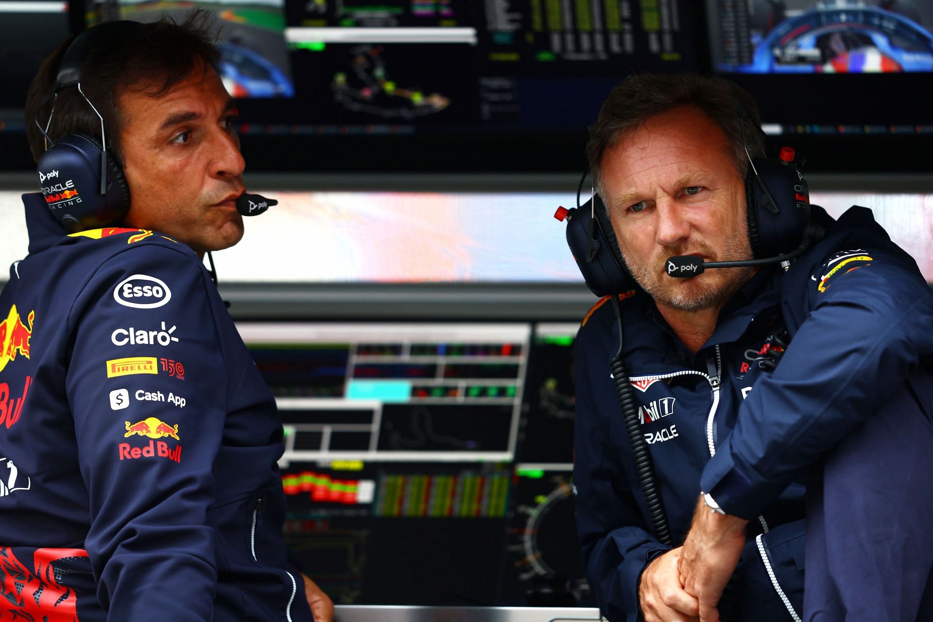 Pierre Wache, Chief Engineer of Performance Engineering Team Principal Christian Horner look on during practice (Photo by Mark Thompson/Getty Images)