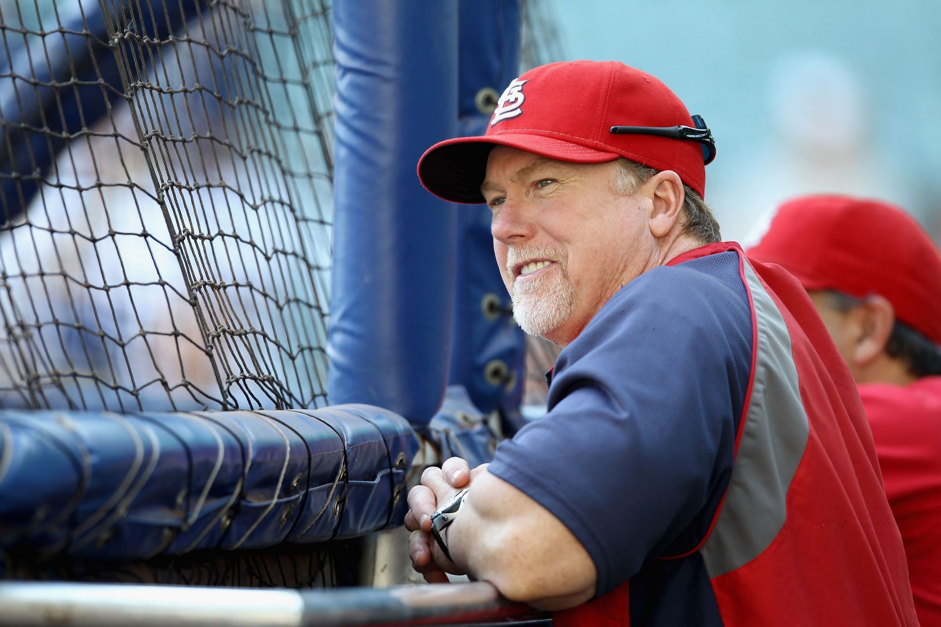 Hitting coach Mark McGwire of the St. Louis Cardinals looks on during batting practice at Miller Park