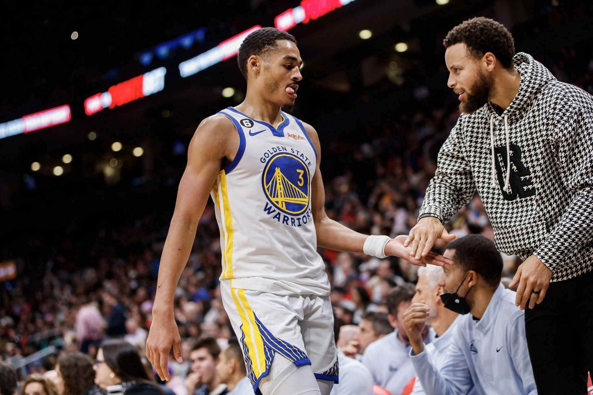 Golden State Warriors rising star guard Jordan Poole and teammate Steph Curry