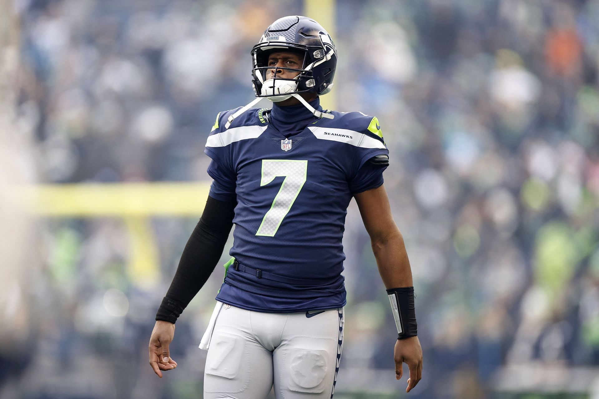 Quarterback Geno Smith walks out of the tunnel before the game against his  former team, the New York Jets, on January 1, 2023. The Seahawks…