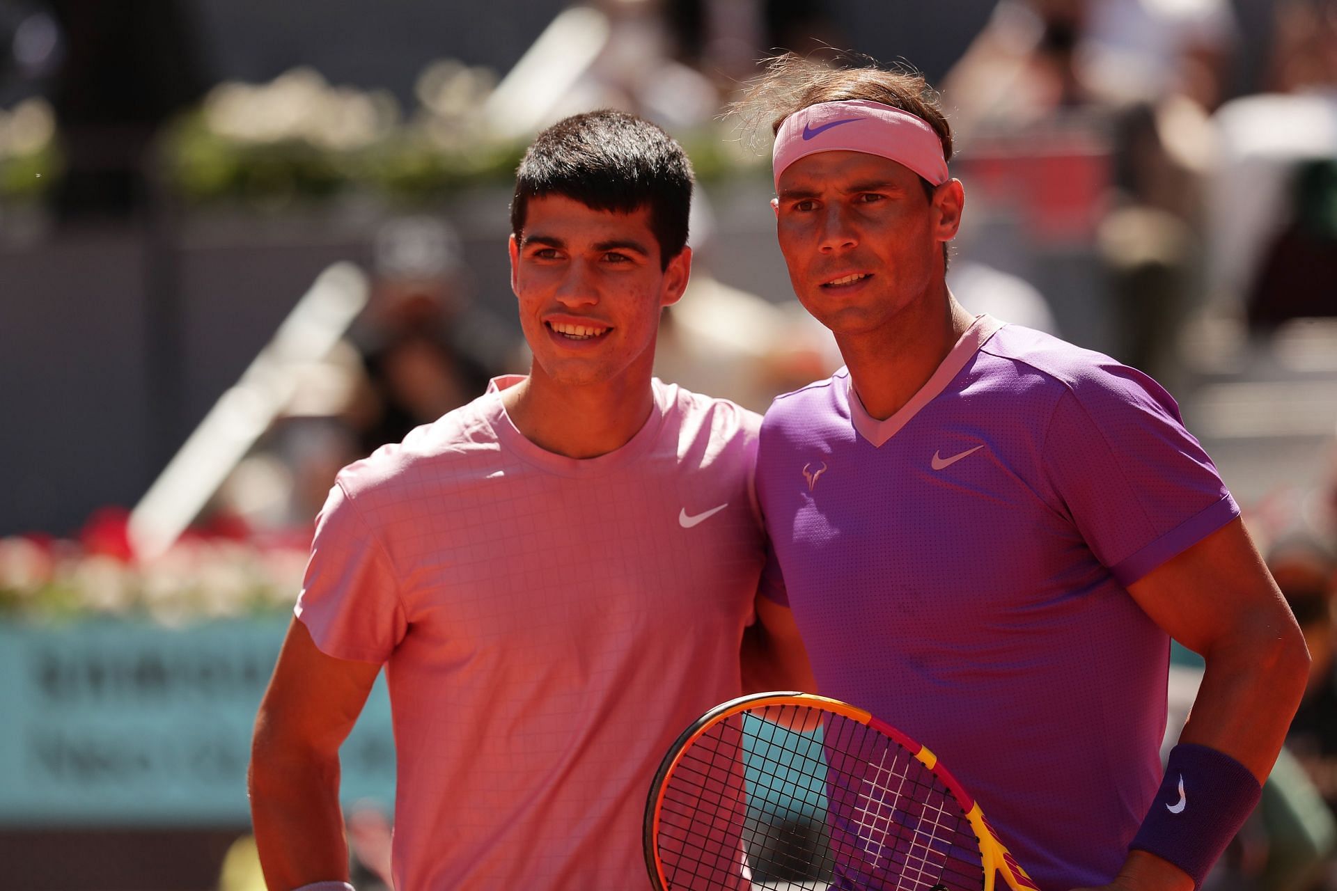 Carlos Alcaraz pictured with Rafael Nadal at the 2022 Mutua Madrid Open.