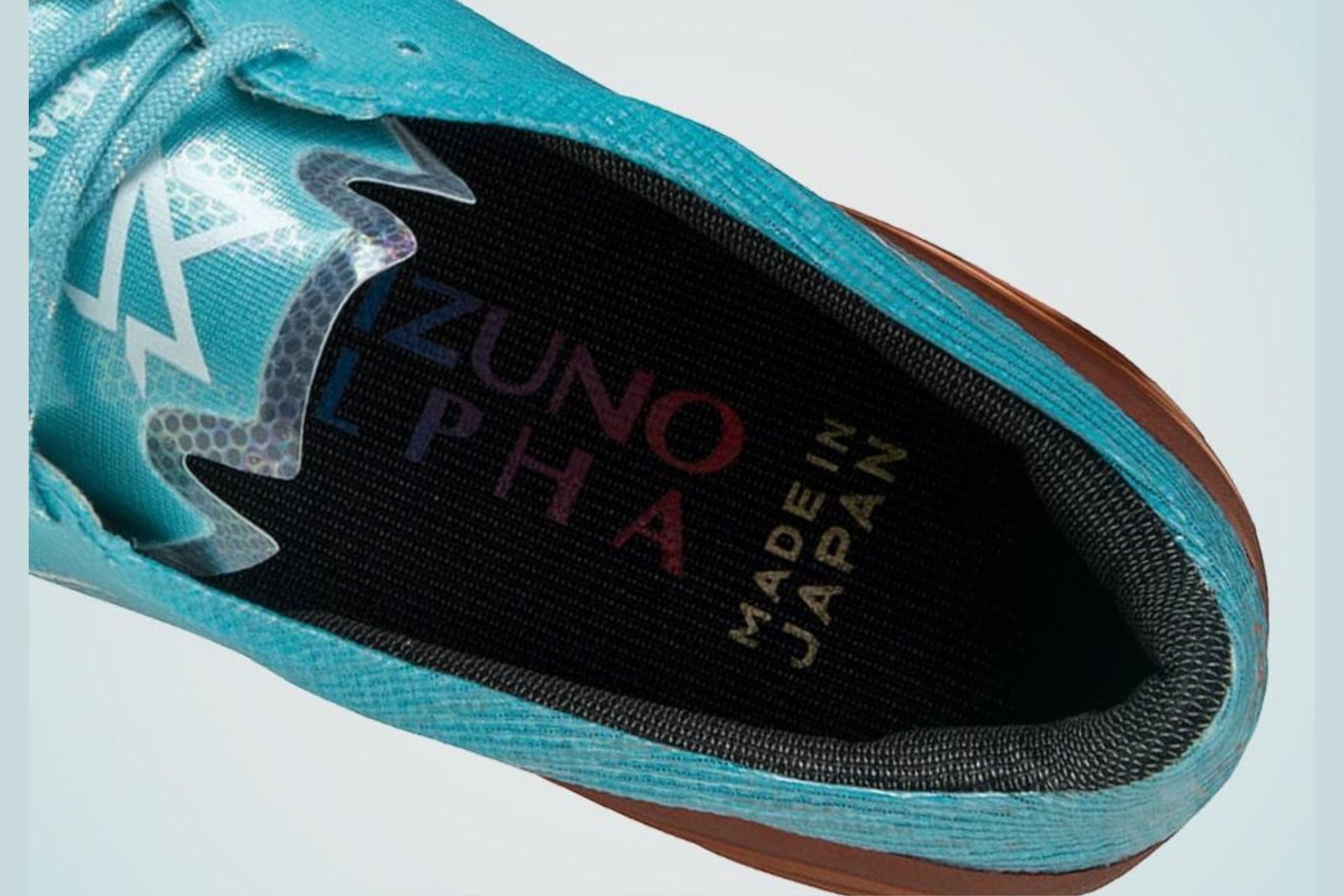 Here&#039;s a detailed look at the inner lining and insole branding accents of the boots (Image via Mizuno)