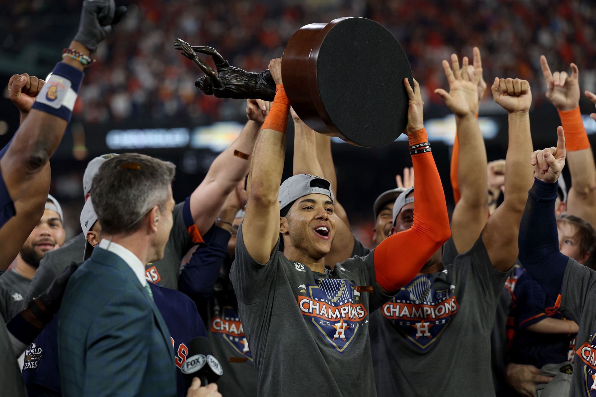 Jeremy Pena lifts the Willie Mays World Series Most Valuable Player Award after defeating the Philadelphia Phillies in the 2022 World Series