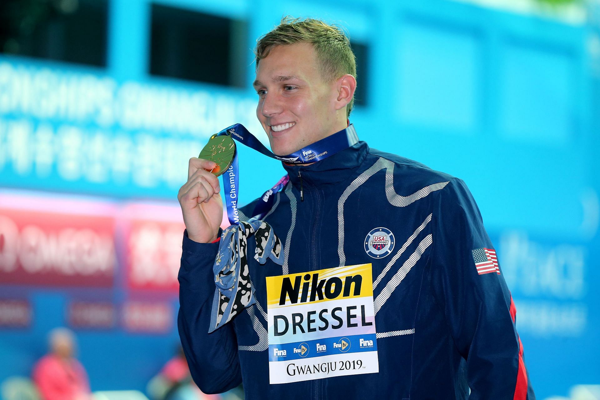 Dressel poses with his gold medal during the 2019 FINA World Championships