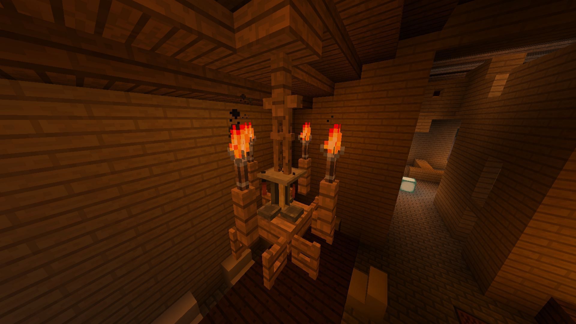 Torches and a few fences can also be used to create chandeliers in Minecraft (Image via Reddit / u/StalkerCelly)
