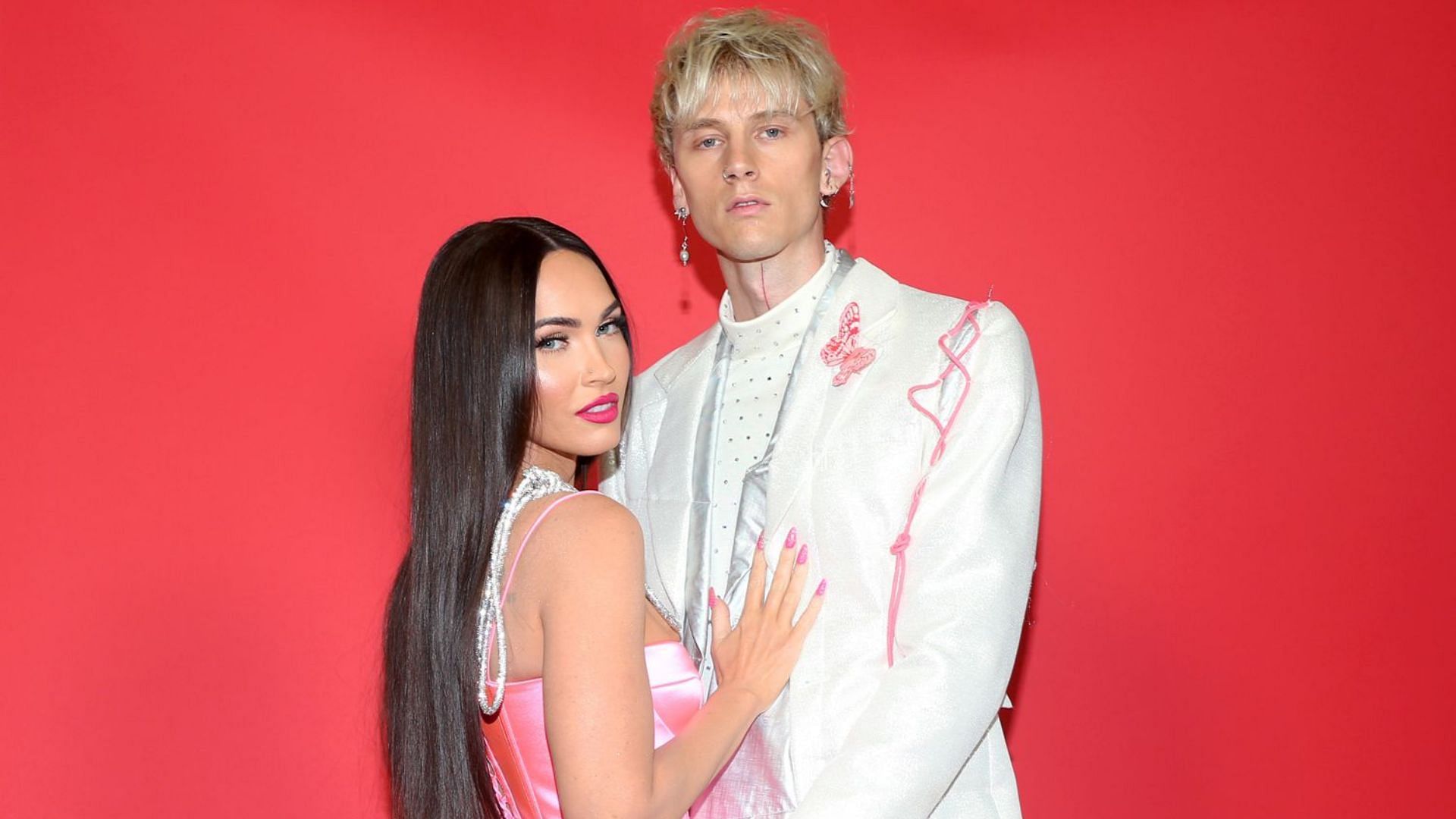 Machine Gun Kelly tries to ward of prospects as Megan Fox claims to search for a new girlfriend (Image via Getty/Phillip Faraone)
