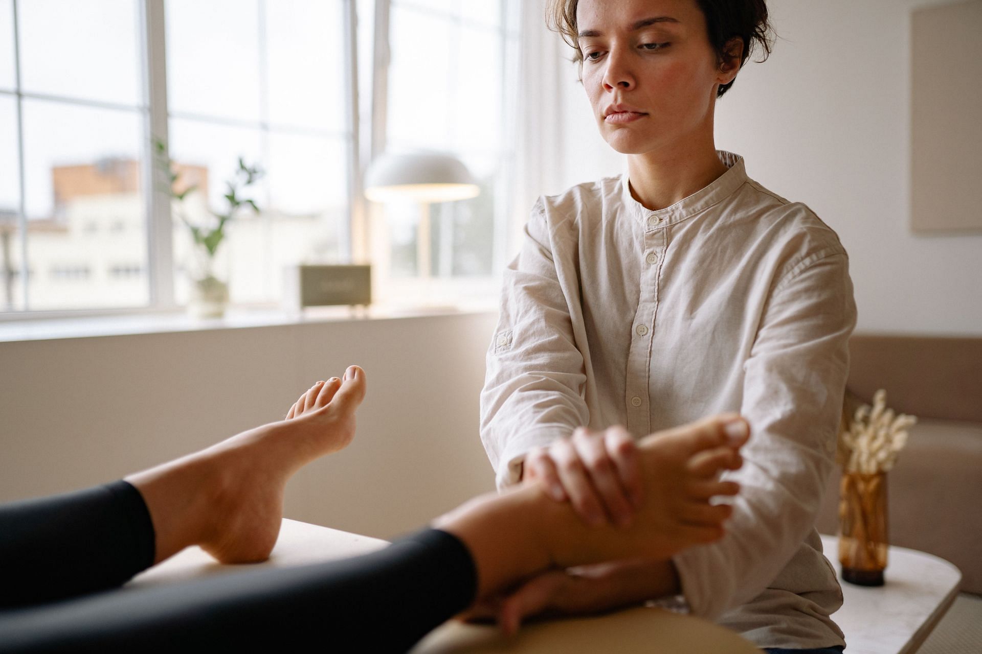 Massage can also help with diabetes foot pain (Image via Pexels/Yan Krukao)