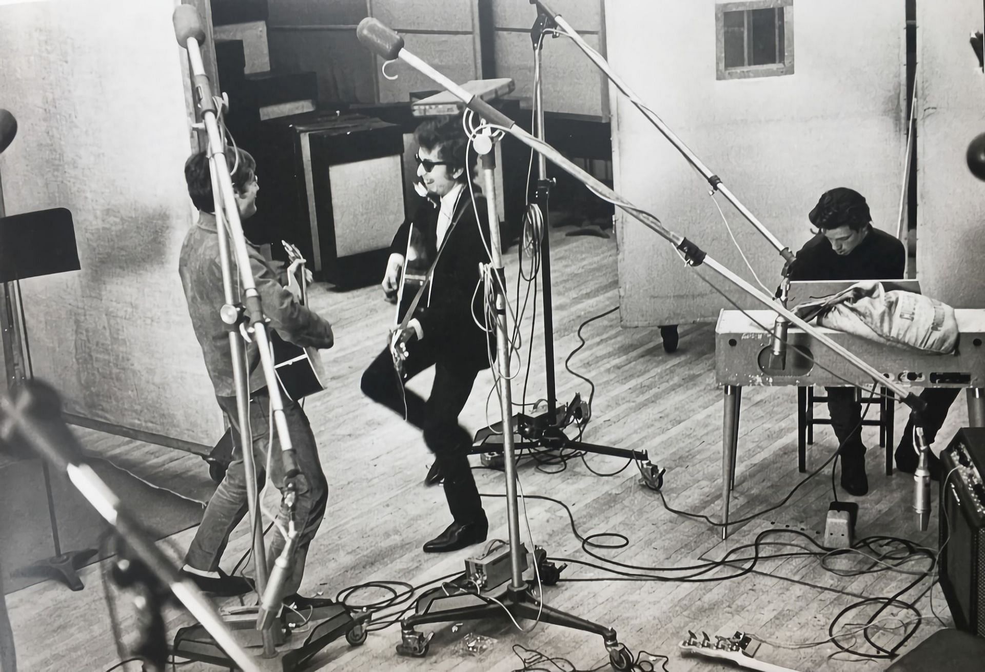 John Sebastian, Bob Dylan, and John Hammond Jr. in a Recording Studio, 1965 (Image via Daniel Kramer)