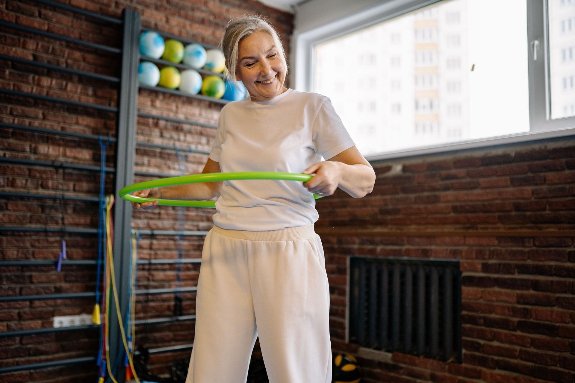 Everyone can perform hula hoop exercises, no matter your age, whether you&#039;re 6 or 60. (Image via Pexels/ Yan Krukau)