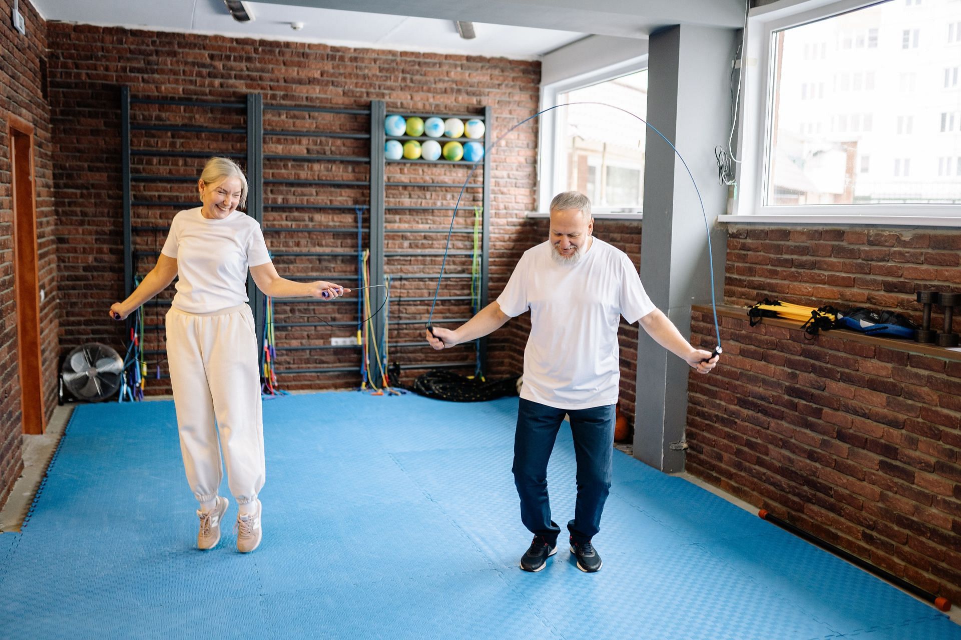 Jumping rope with a partner can be a great way to bond with them while also burning calories.(Image via Pexels/yan krukau)