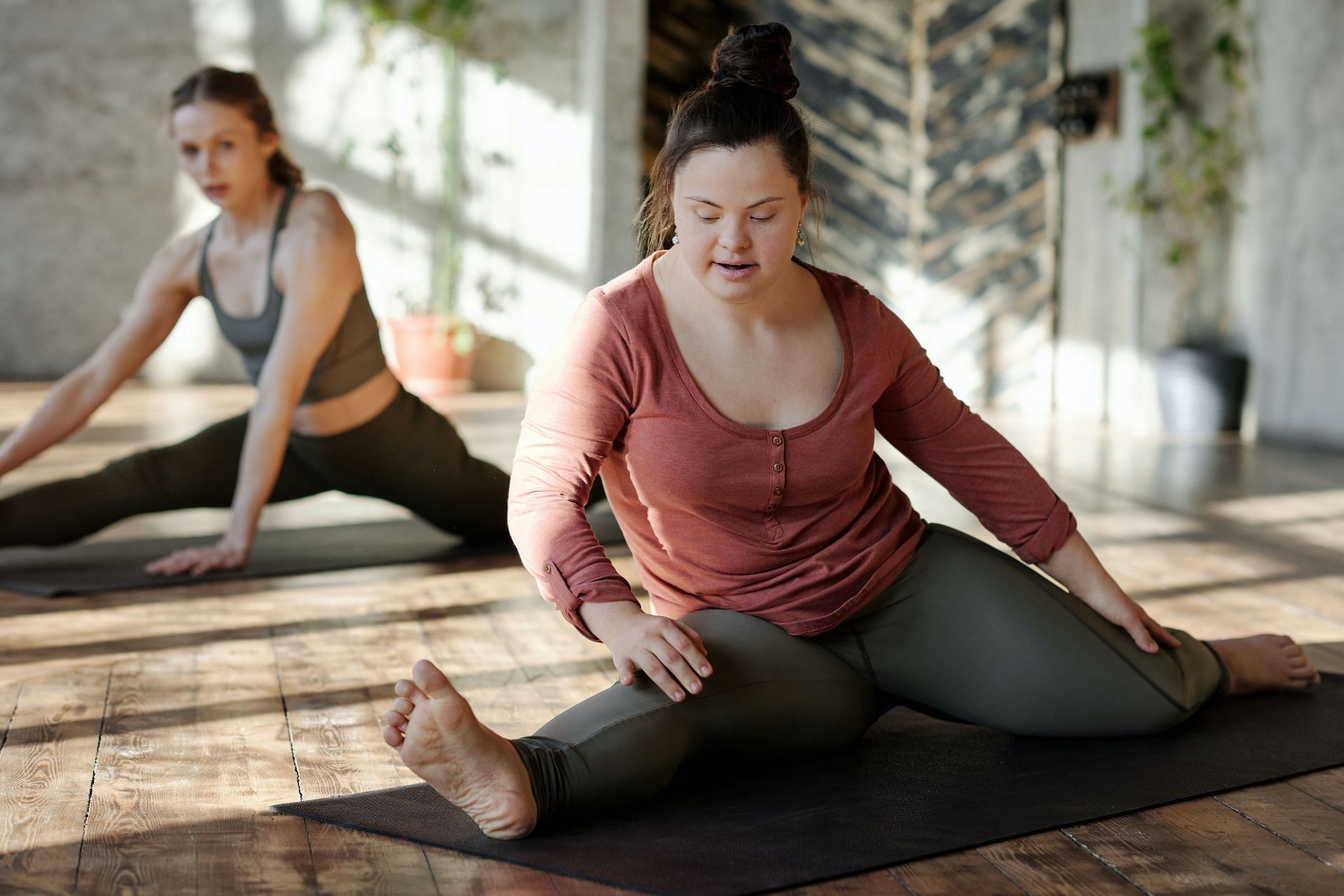 Groin stretches are a great way to stretch your inner thighs (Image via Pexels/Cliff Booth)