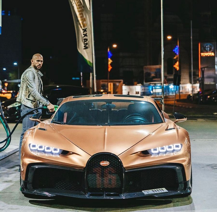 Andrew Tate with the infamous Bugatti Chiron (Image via Twitter/@cobratate)