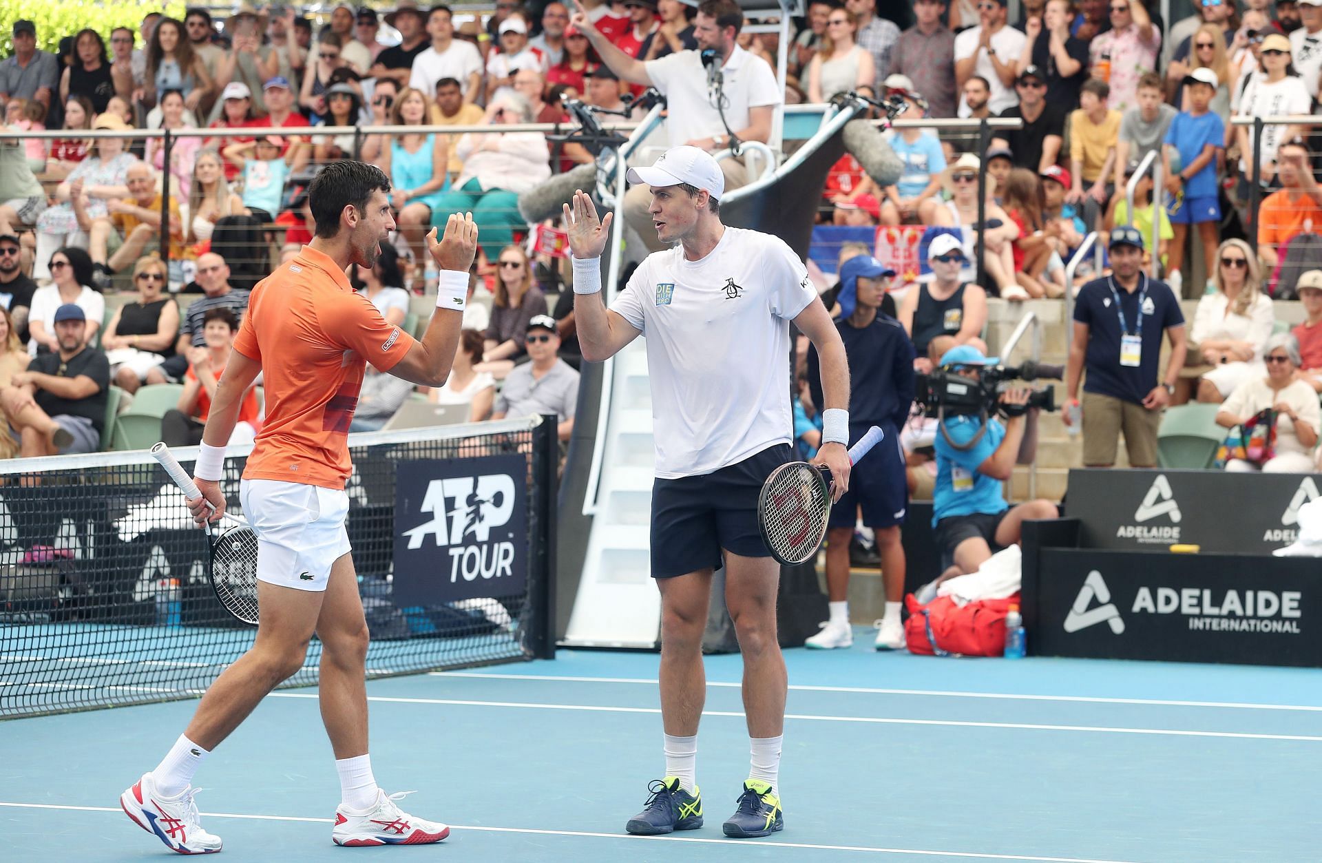 PTPA founders Novak Djokovic and Vasek Pospisil during a doubles match at the 2023 Adelaide International 1.