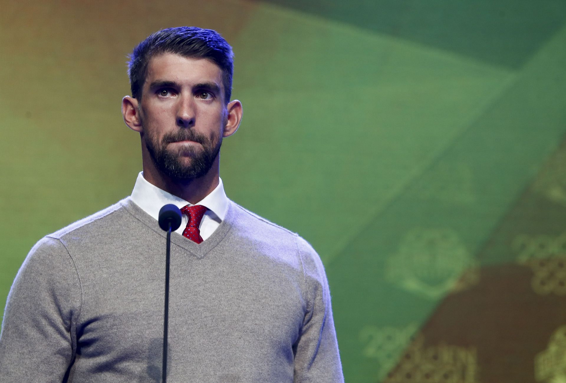 Michael Phelps accepts the Impact Award during the 2016 Golden Goggle Awards at the Marriott Marquis Hotel on November 21, 2016, in New York City. (Photo by Jeff Zelevansky/Getty Images)