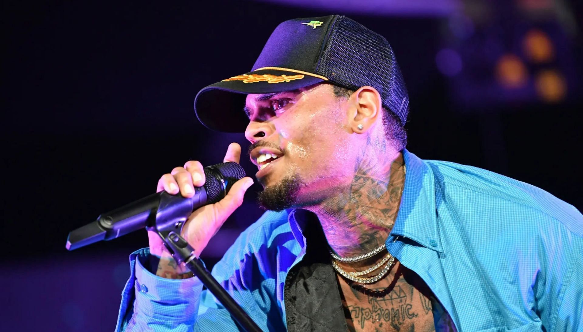 Chris Brown has been slapped with $4 million in income tax bills. (Image via Getty)