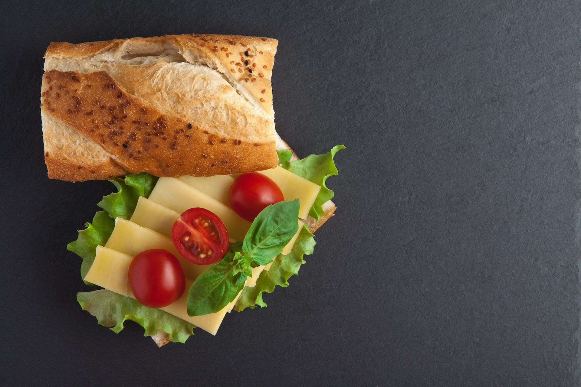 Cheddar cheese is used in sandwiches, pizzas, and burgers. (Photo via Pexels/&Ouml;nder &Ouml;rtel)