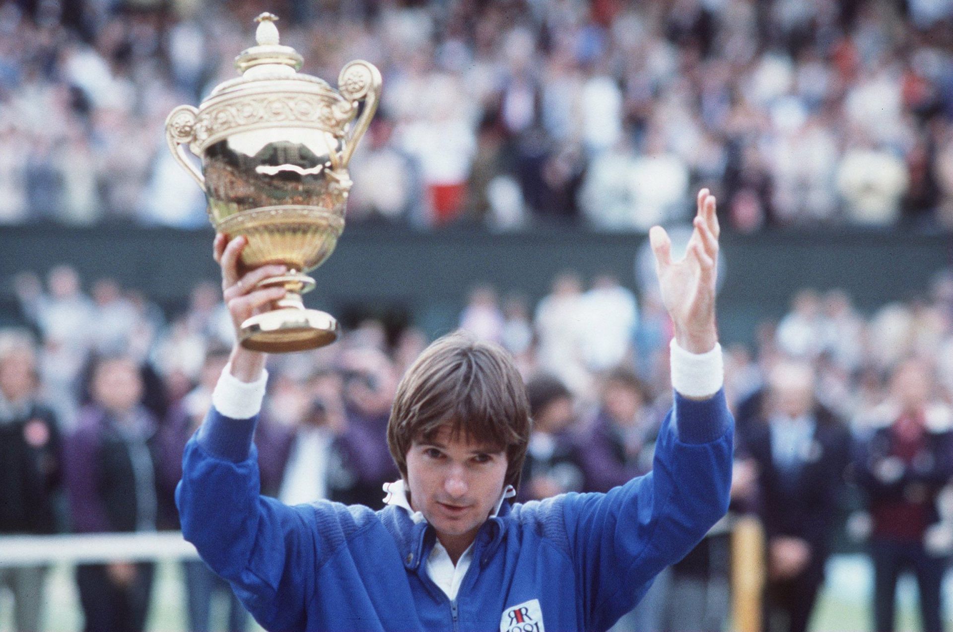 Jimmy Connors with his 1982 Wimbledon Trophy