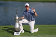 Rory McIlroy with the Hero Dubai Desert Classic trophy