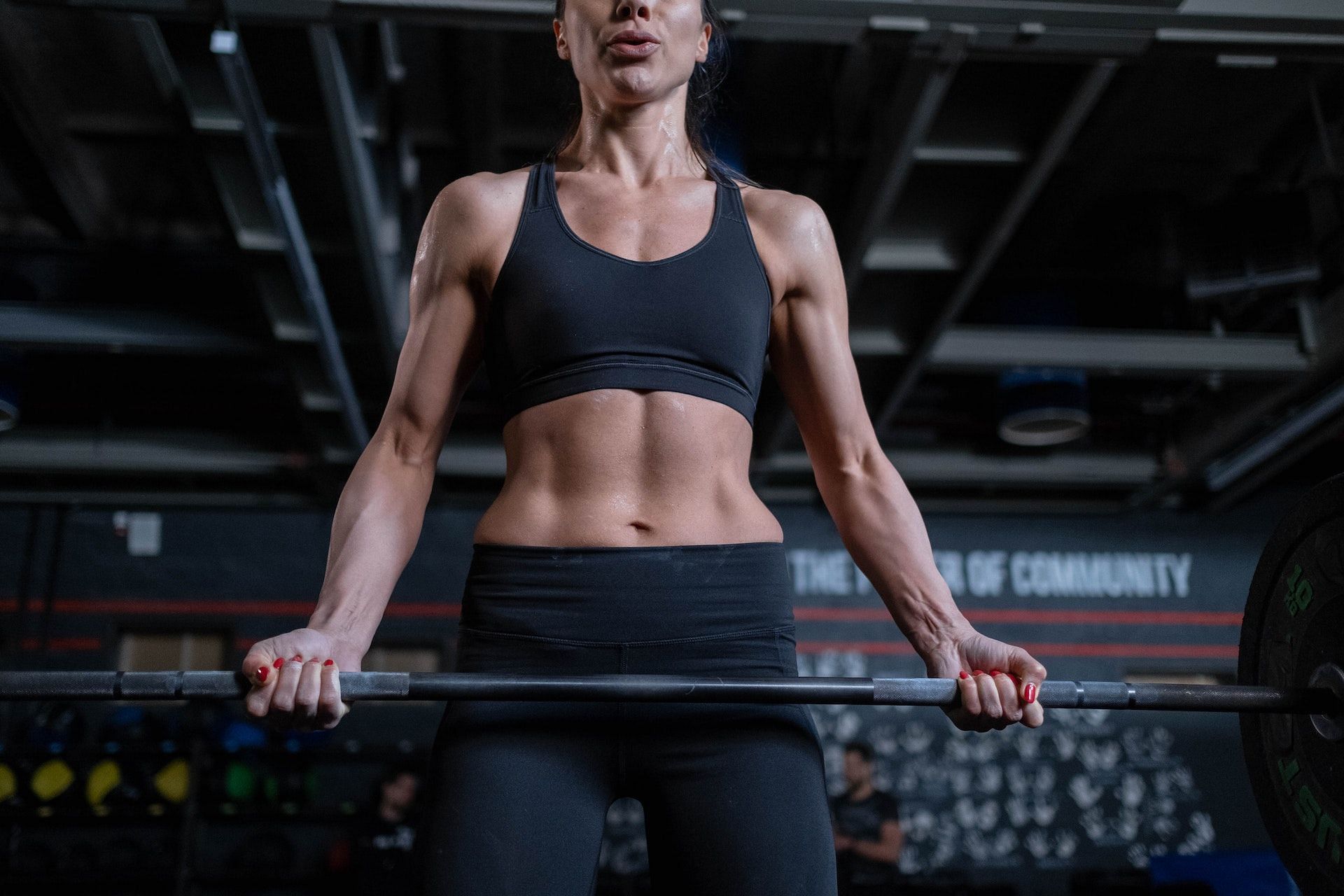 Squats improve core strength. (Photo via Pexels/cottonbro studio)