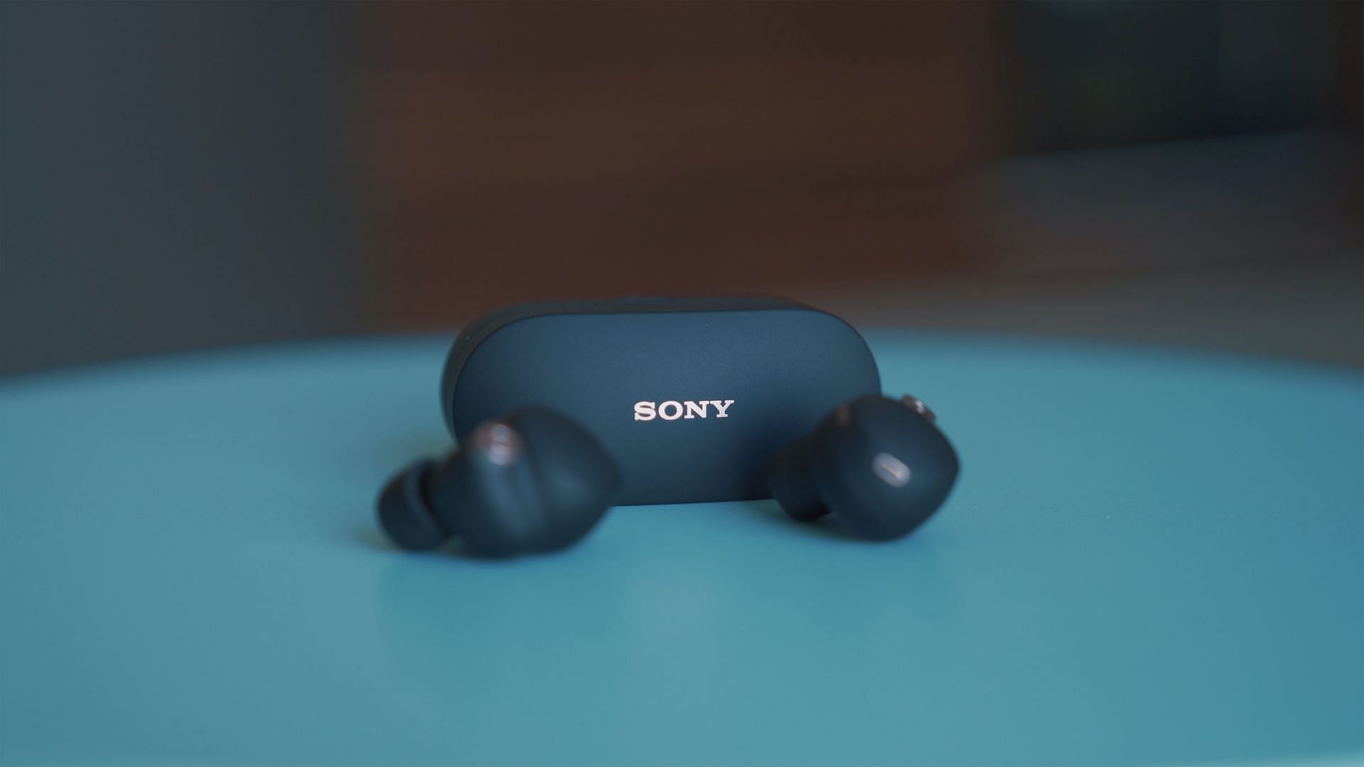 Sony redesigned these buds to fit roundly in the ear. (Photo via Unsplash/Onur Binay)