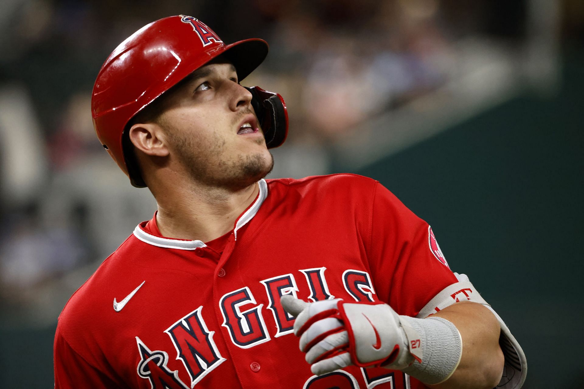 Mike Trout looks toward the scoreboard after hitting into a double play against the Texas Rangers at Globe Life Field