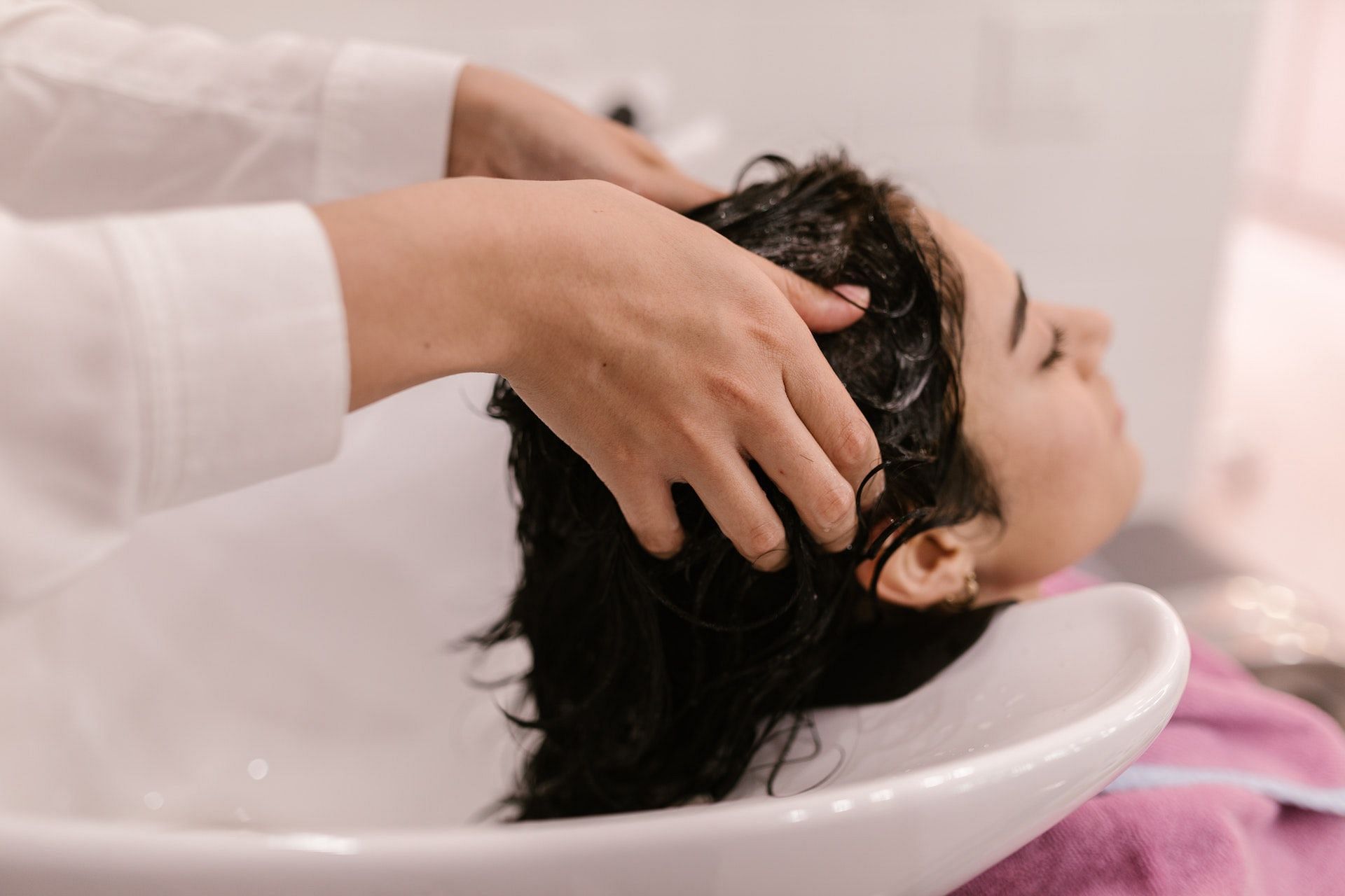 The best hair treatment for damaged hair is to use a gentle shampoo and conditioner. (Photo via Pexels/RODNAE Productions)