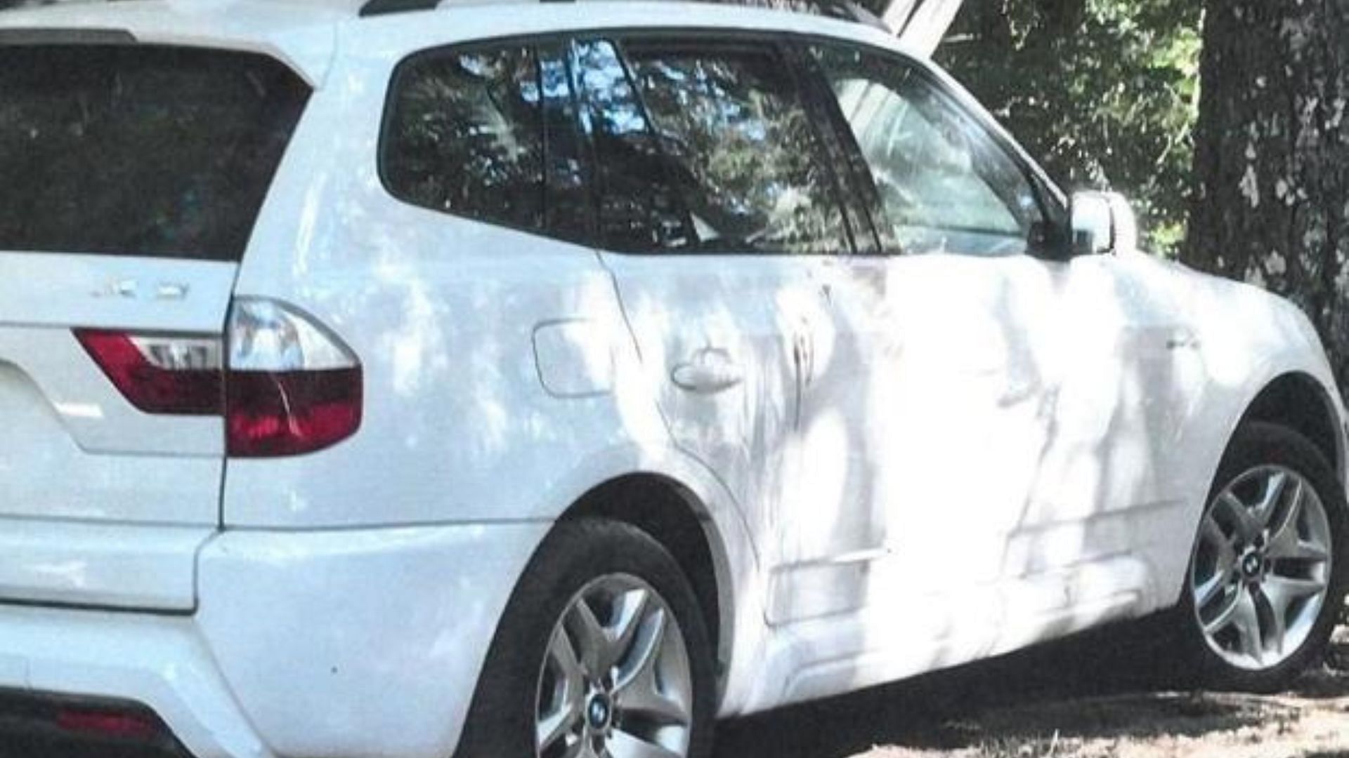 A still of the white BMW SUV that was used in the kidnapping of Tushar Atre (Image Via CBS News)