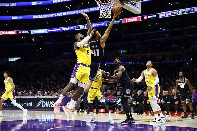 Which defensive record did LeBron James surpass in LA Lakers' win over Memphis Grizzlies?