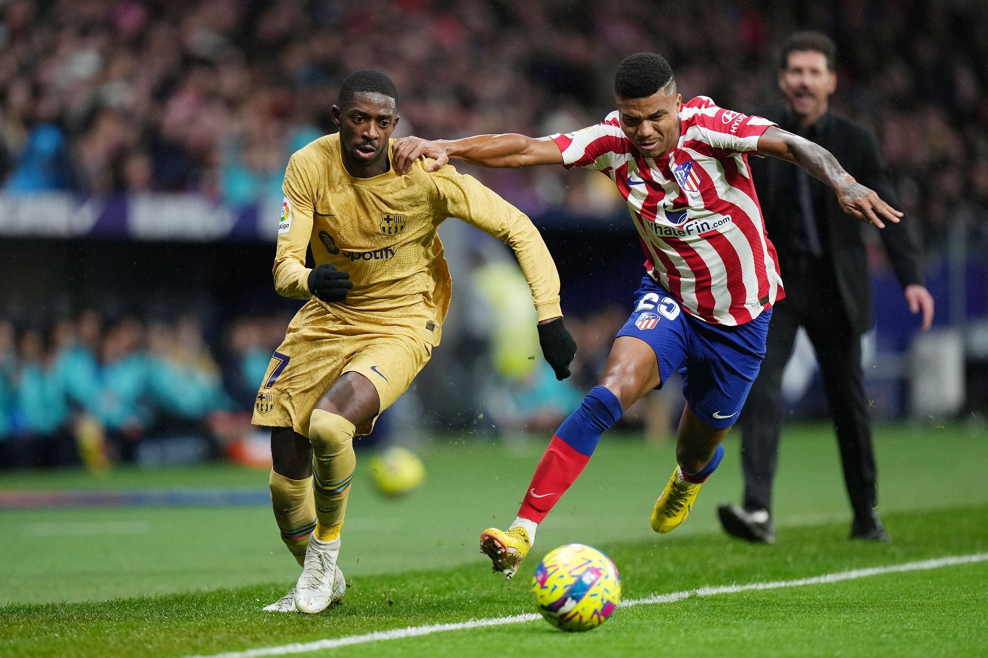Barcelona forward Ousmane Dembele (left) in action against Atletico Madrid