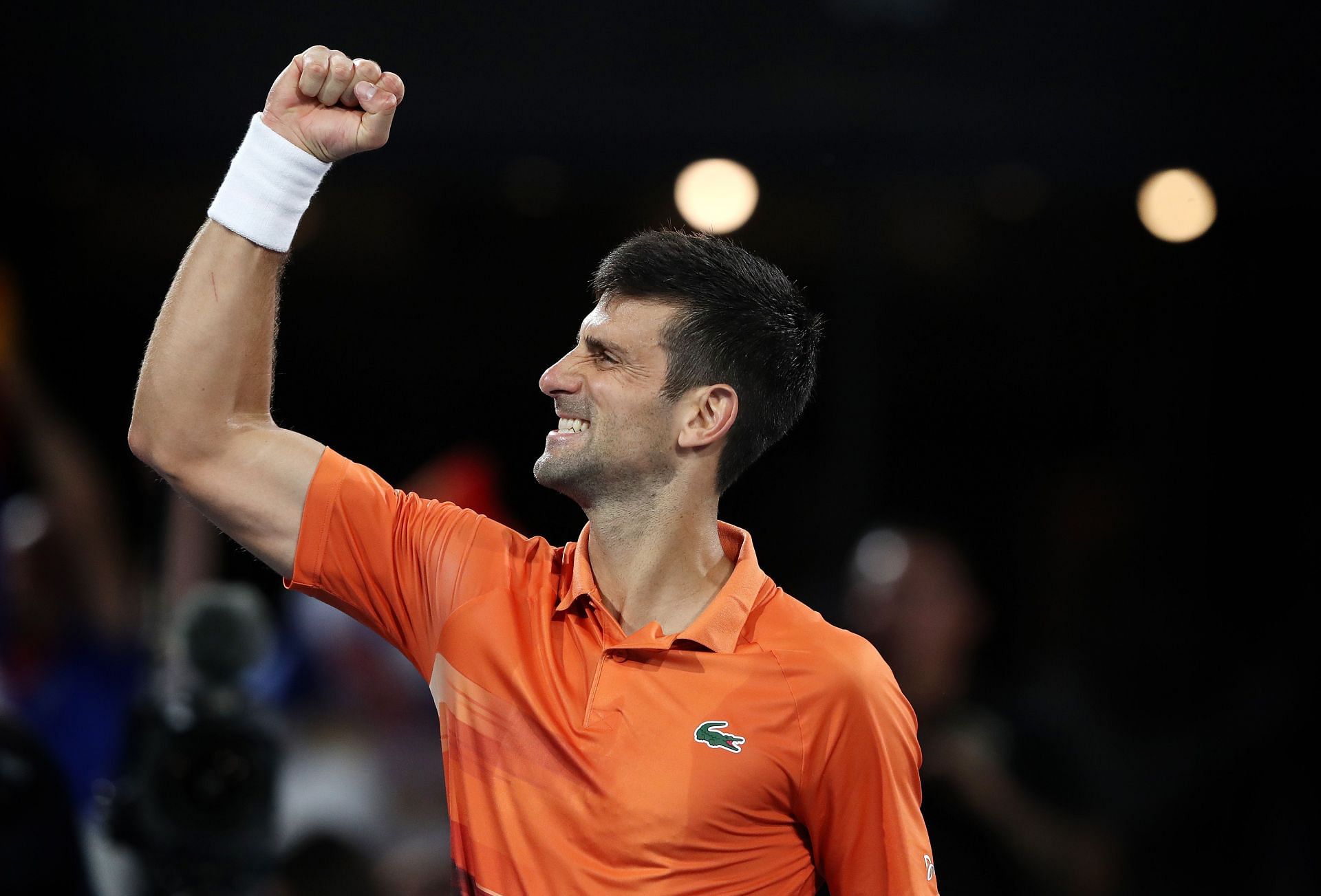 Novak Djokovic celebrates after beating Sebastian Korda