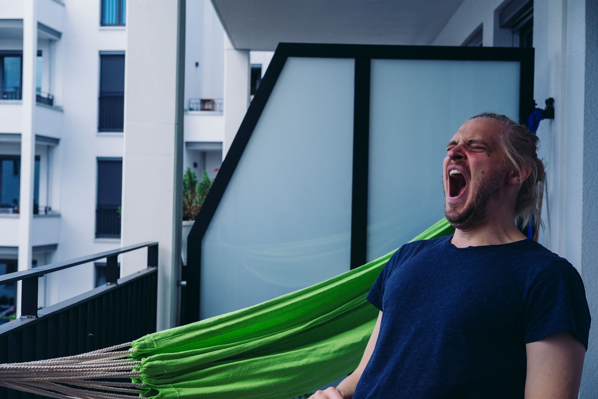 You may have a sleep problem if you are having frequent yawns. (Image via Unsplash/Miikka Luotio)