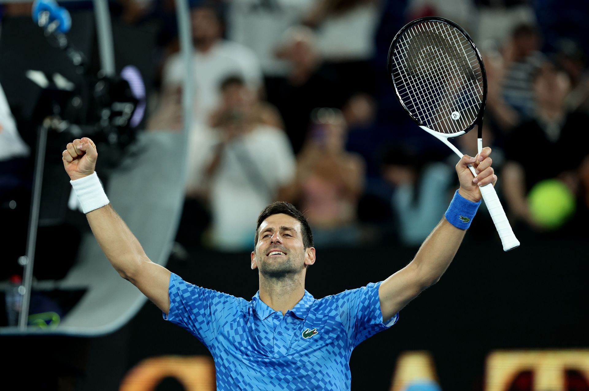 Novak Djokovic celebrates his 2023 Australian Open 1R win against Roberto Carballes Baena.