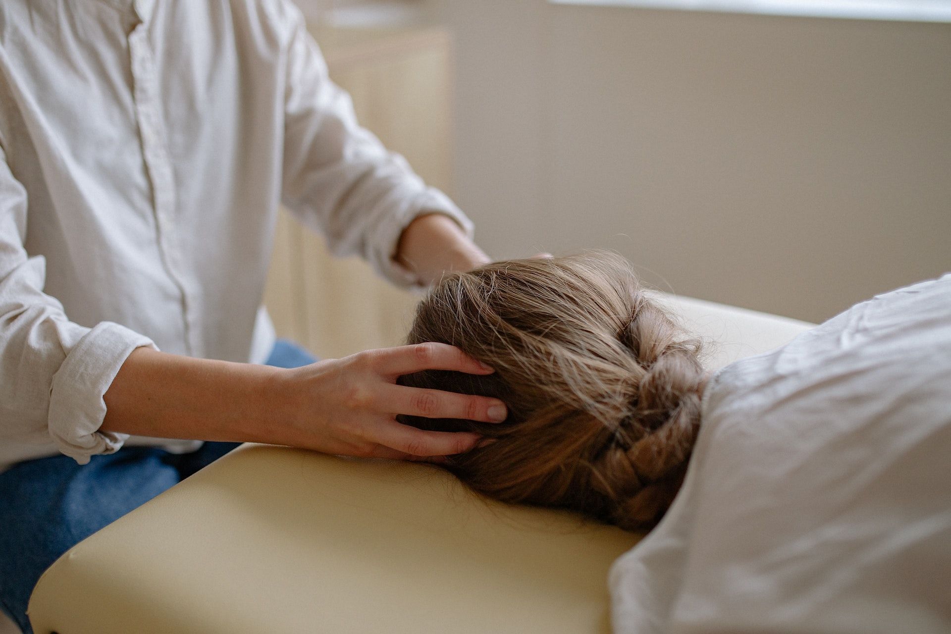 Massaging the scalp stimulates hair growth. (Photo via Pexels/Yan Krukau)