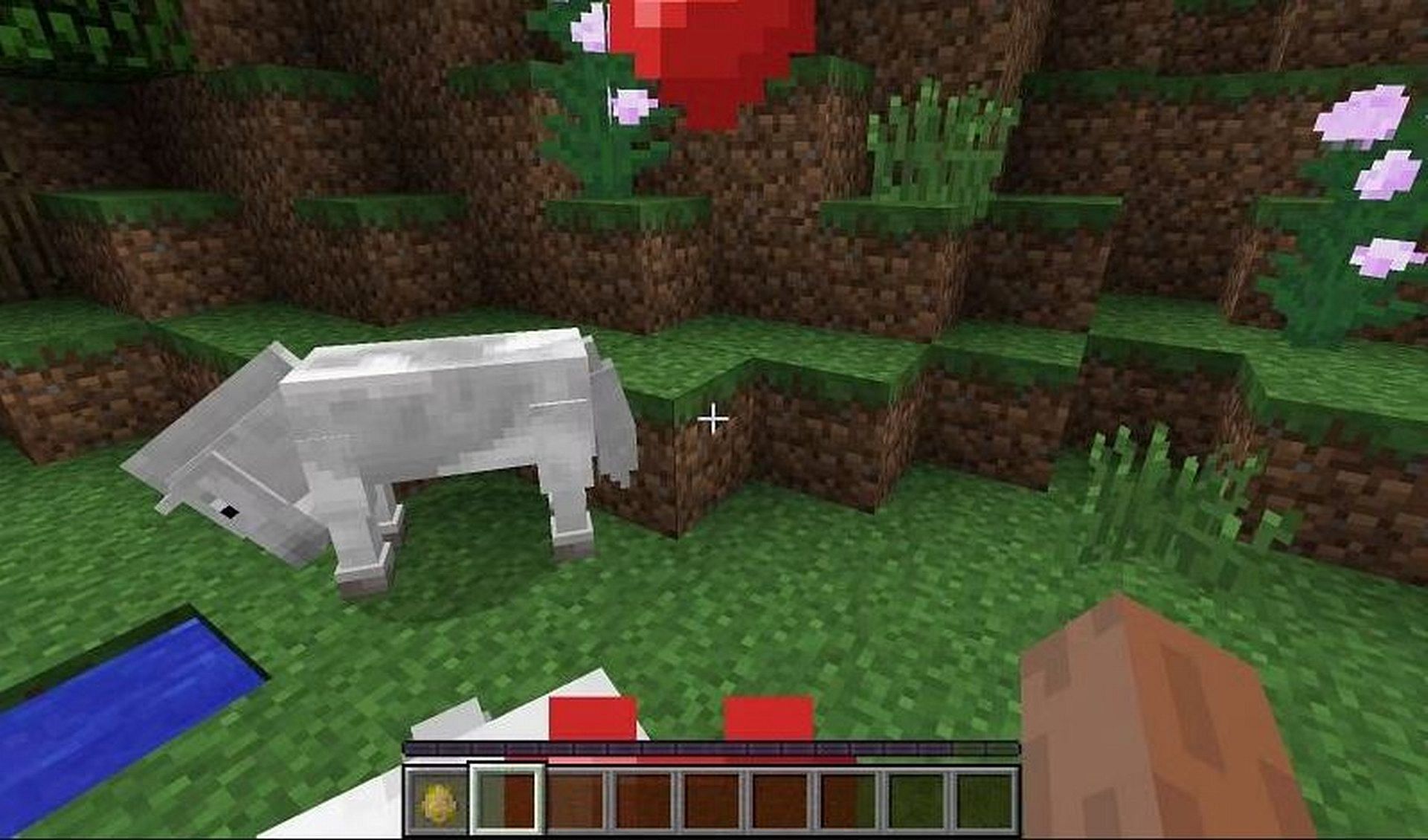 When hearts appear, the animal has been successfully tamed (Image via Minecraft)
