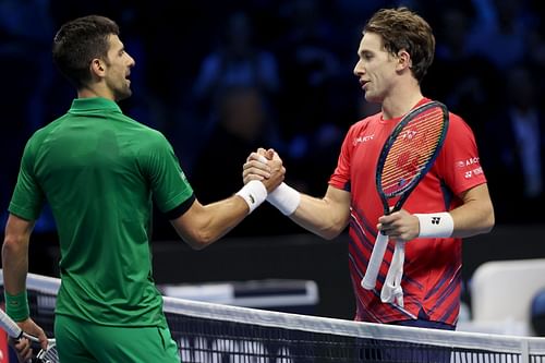 Novak Djokovic and Casper Ruud pictured at the 2022 Nitto ATP Finals - Day Eight.