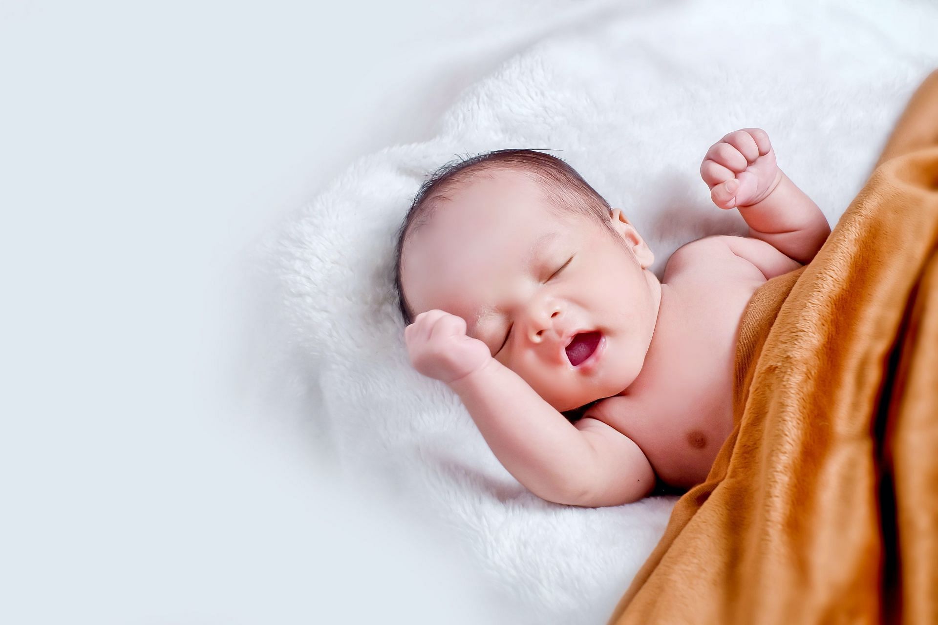 Newborn hiccups may be startling at first. (Image via Pexels/ Kelvin Agustinus)